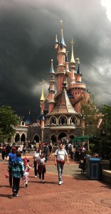 big black clouds and a  castle